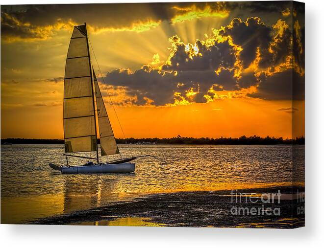 Boats Canvas Print featuring the photograph Sunset Sail by Marvin Spates