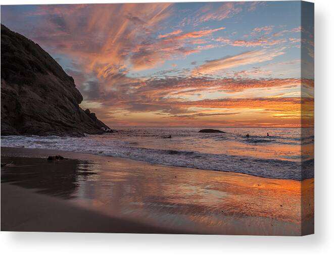 Surfers Canvas Print featuring the photograph Surfers and Sunset at Strands Beach Dana Point by Cliff Wassmann