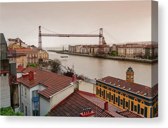 Suspension Bridge Canvas Print featuring the photograph Suspension Bridge In Portugalete by By Juan Ignacio Llana