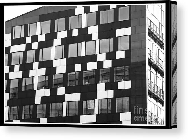 The Building Canvas Print featuring the photograph The Buildilng by Victoria Harrington