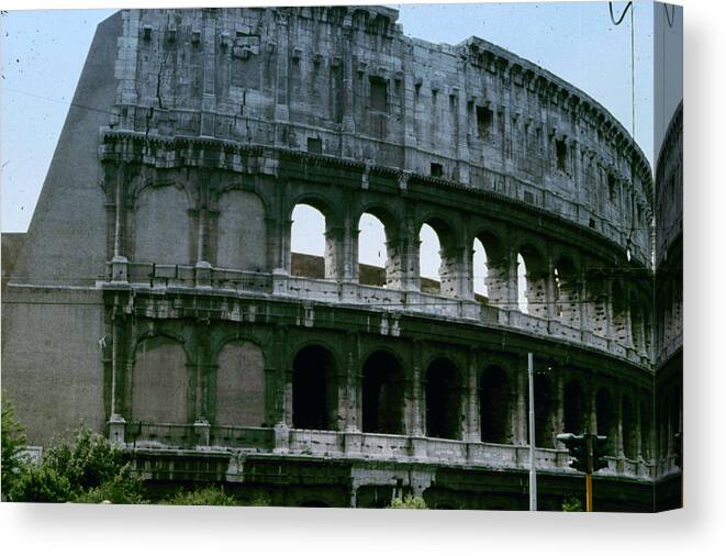 The Colosseum Canvas Print featuring the photograph The Colosseum by Donna Walsh