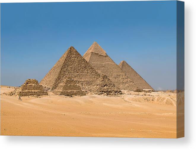 Giza Pyramids Canvas Print featuring the photograph The Giza Pyramids by Mark Whitt