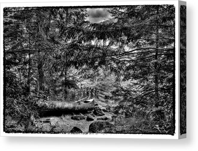 Canoe Canvas Print featuring the photograph The Lone Canoe on Bubb Lake by David Patterson