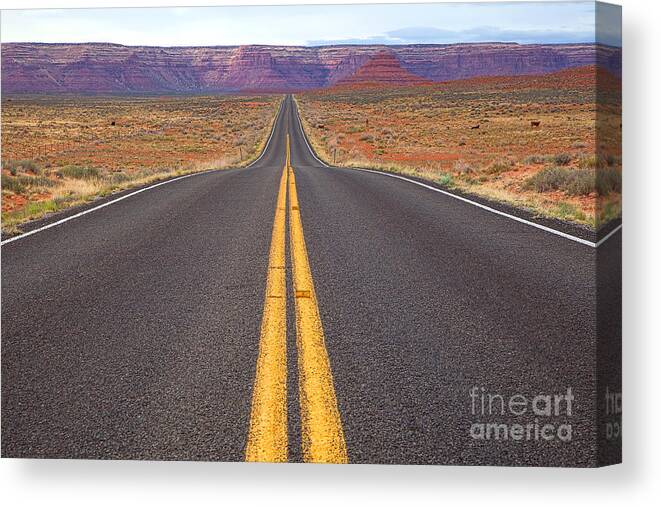 Red Soil Canvas Print featuring the photograph The Long Road Ahead by Jim Garrison