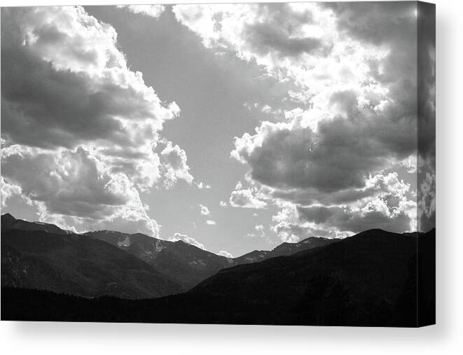 Clouds Canvas Print featuring the photograph The Parting by Tracy Michicich