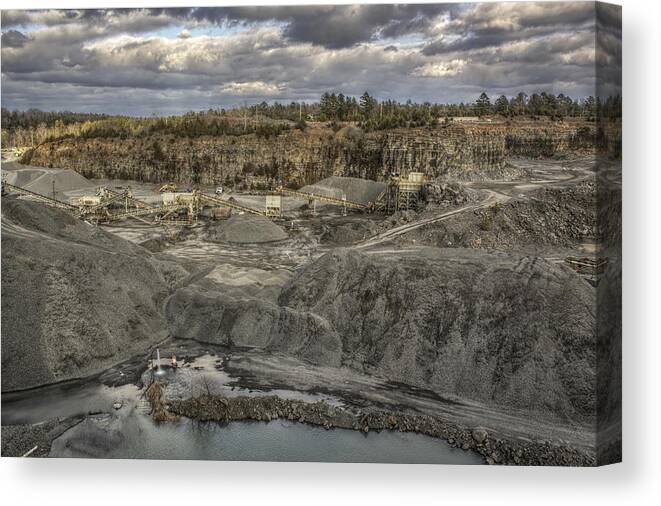 Quarry Canvas Print featuring the photograph The Rock Quarry by Jason Politte