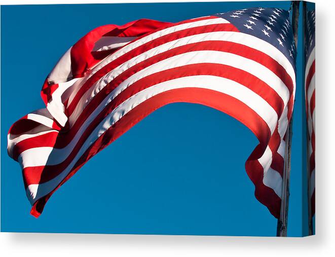 Flag Canvas Print featuring the photograph The Stars and Stripes Waving by David Patterson