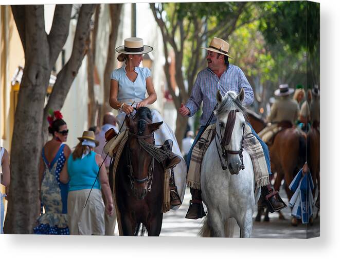 Andalusia Canvas Print featuring the photograph The Talk. Romeria in Torremolinos. Spain by Jenny Rainbow