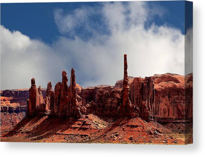 Utah Canvas Print featuring the photograph The Totems Monument Valley by Tom Prendergast