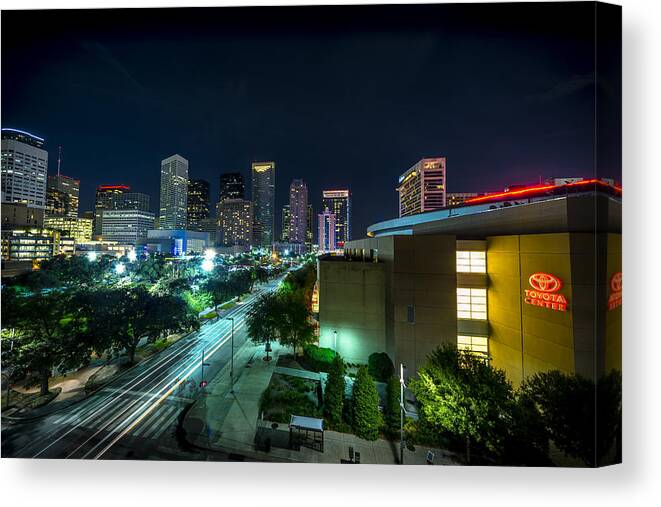 Toyota Center Canvas Print featuring the photograph Toyota Center and Downtown Houston by David Morefield