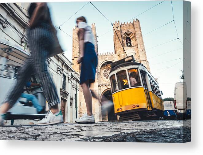 People Canvas Print featuring the photograph Traffic Around Lisbon Cathedral by Borchee