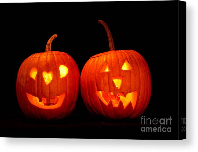 Halloween Canvas Print featuring the photograph Two Carved Jack O Lantern Pumpkins by James BO Insogna