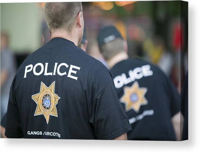 Mid Adult Men Canvas Print featuring the photograph Two gang / narcotics police officers by Photodisc