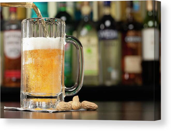 Nut Canvas Print featuring the photograph Usa, Illinois, Metamora, Pouring Lager by Vstock Llc