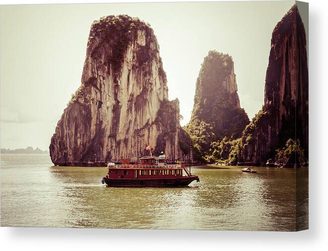 Scenics Canvas Print featuring the photograph Vietnamese Junk Cruising On Halong Bay by Fototrav