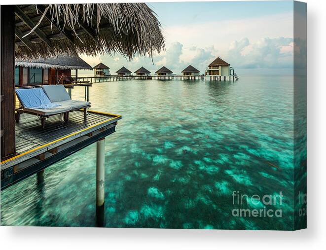 Water Bungalows Canvas Print featuring the photograph Waterbungolaws by Hannes Cmarits