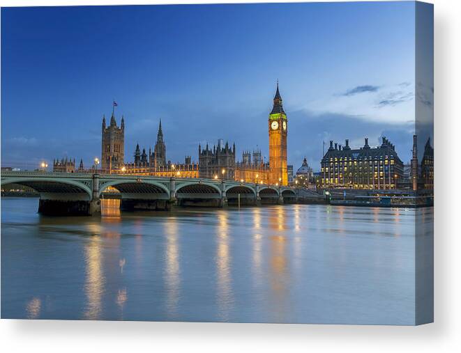 Clock Tower Canvas Print featuring the photograph Westminster Palace in London at dusk by _ultraforma_