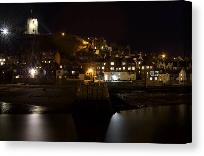 Britain Canvas Print featuring the photograph Whitby East Cliff By Night by Rod Johnson