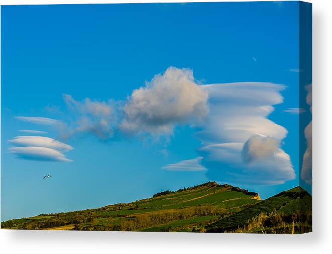 Above Canvas Print featuring the photograph White Clouds Form Tornado by Joseph Amaral