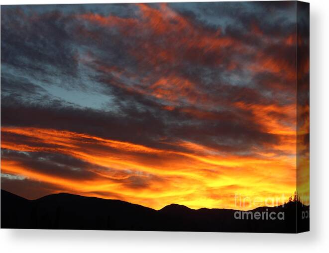 Sunrise Canvas Print featuring the photograph Wild Sunrise Over The Mountains by Fiona Kennard