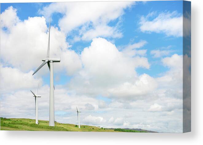 Grass Canvas Print featuring the photograph Wind Farm Landscape by Peter Dazeley