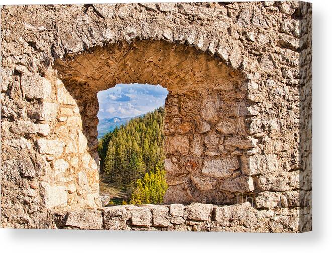 Wall Canvas Print featuring the photograph Window in the castle wall by Les Palenik
