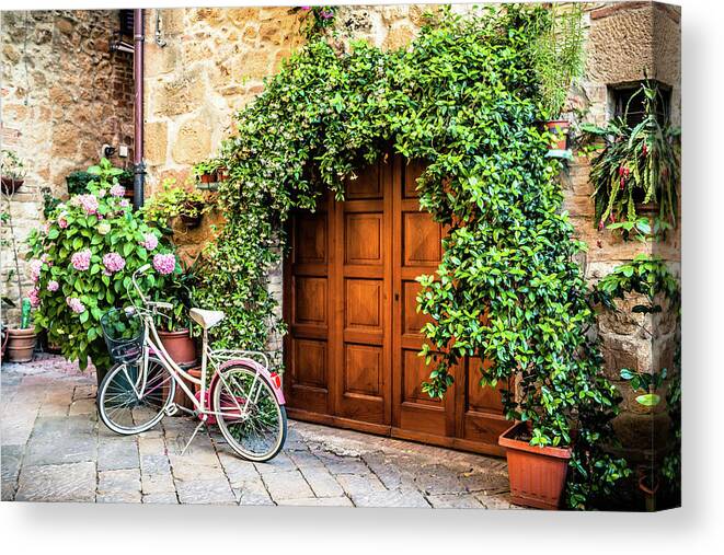 Val D'orcia Canvas Print featuring the photograph Wooden Gate With Plants In An Ancient by Giorgiomagini