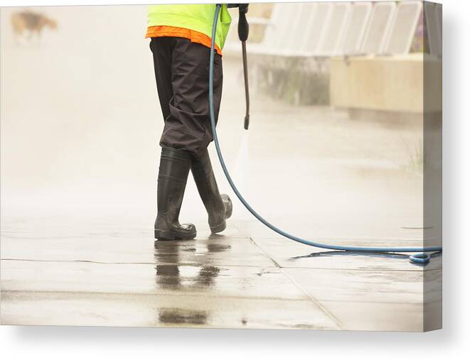 Working Canvas Print featuring the photograph Worker Steam Cleans Sidewalk Dog by ChuckSchugPhotography