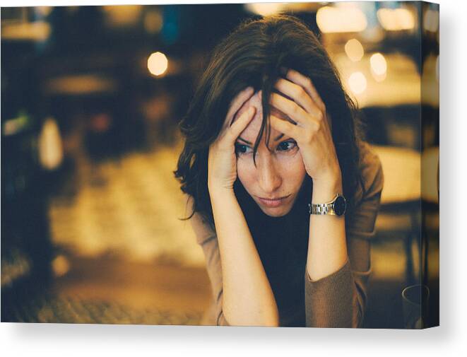 Problems Canvas Print featuring the photograph Worried woman by Photo by Rafa Elias