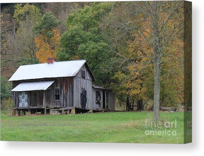  Wood Trees Canvas Print featuring the photograph Ye old cabin in the fall by Jennifer E Doll