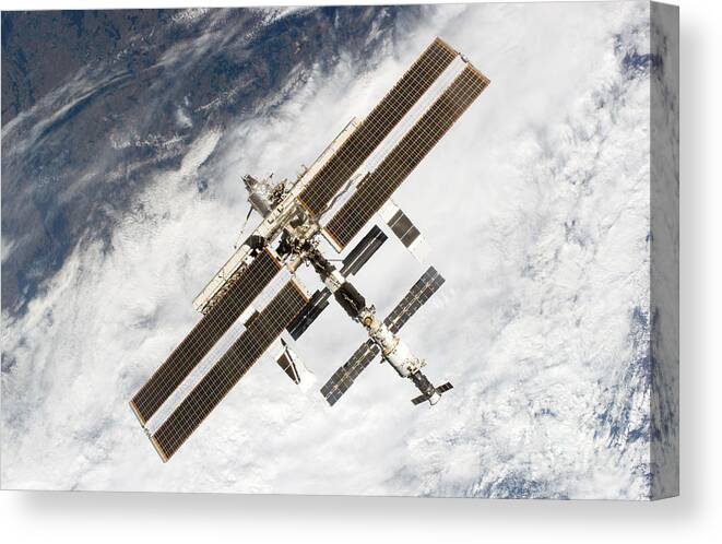 Astronomy Canvas Print featuring the photograph International Space Station #1 by Nasa