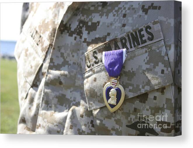 Us Marines Canvas Print featuring the photograph The Purple Heart Award Hangs #1 by Stocktrek Images