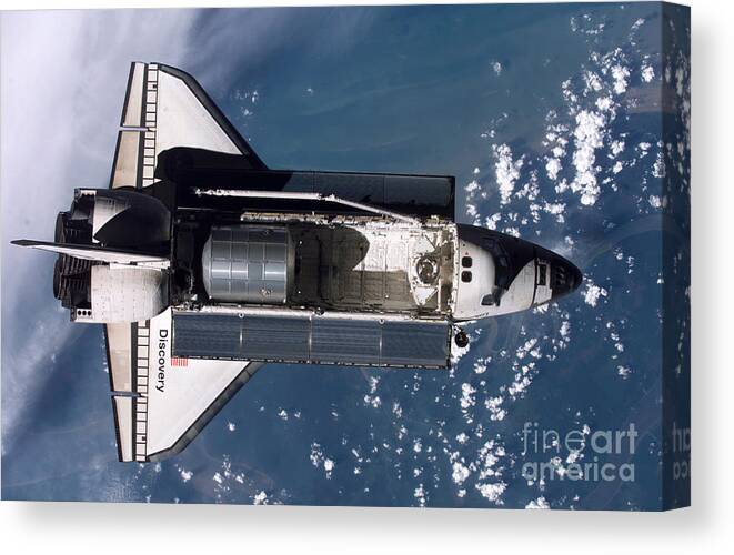 Astronomy Canvas Print featuring the photograph Space Shuttle Discovery #10 by Nasa