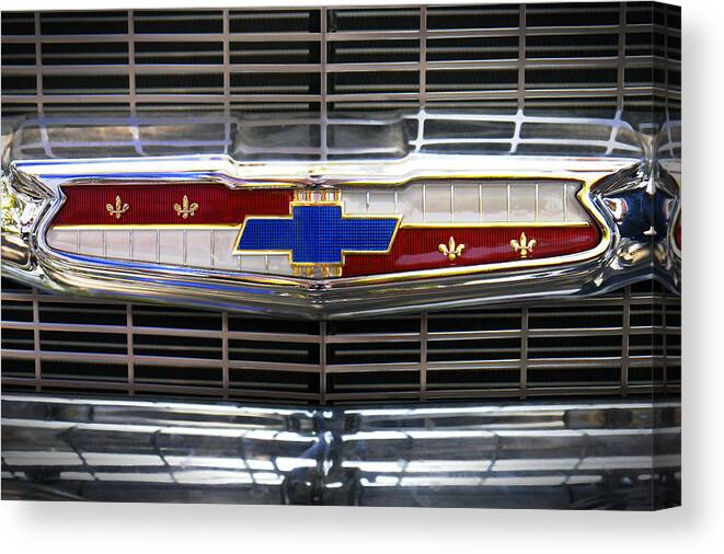 Transportation Canvas Print featuring the photograph 1956 Chevrolet Grill Emblem by Mike McGlothlen