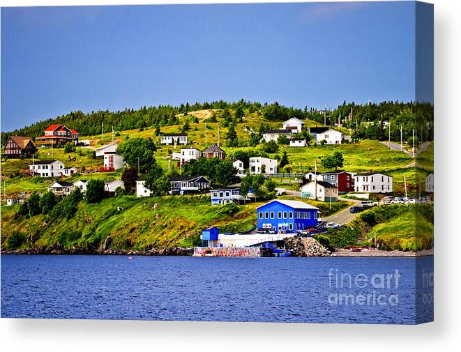 Fishing Canvas Print featuring the photograph Fishing village in Newfoundland 1 by Elena Elisseeva