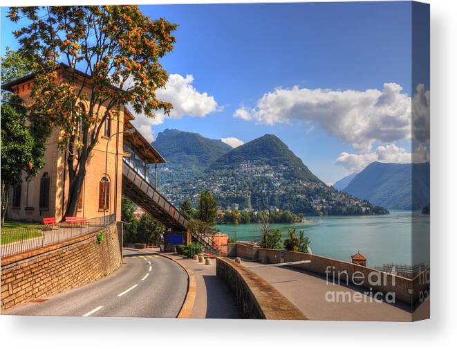 Road Canvas Print featuring the photograph Road and mountain #2 by Mats Silvan
