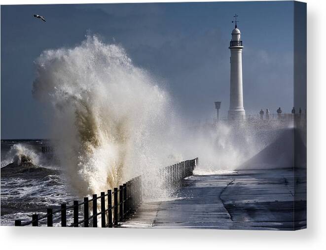 Building Exterior Canvas Print featuring the photograph Waves Crashing By Lighthouse At #4 by John Short