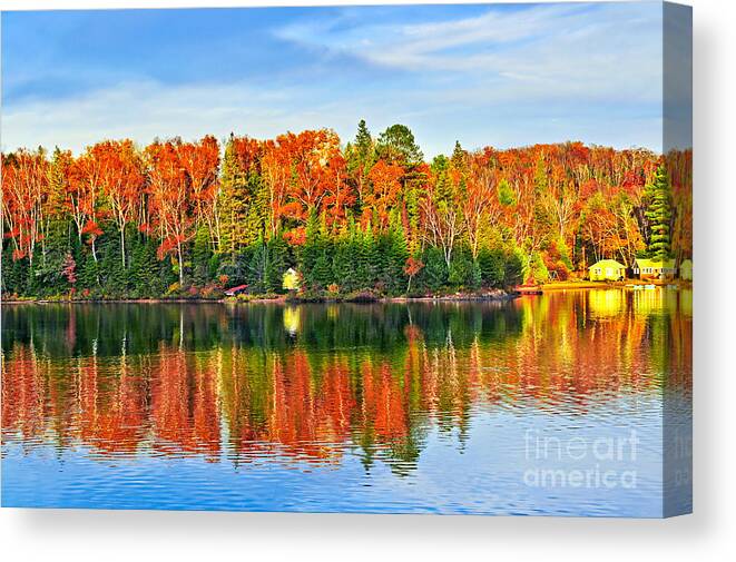 Lake Canvas Print featuring the photograph Autumn lake reflections by Elena Elisseeva