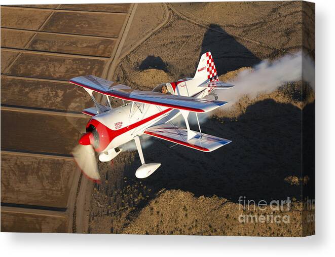 Transportation Canvas Print featuring the photograph A Pitts Model 12 Aircraft In Flight by Scott Germain