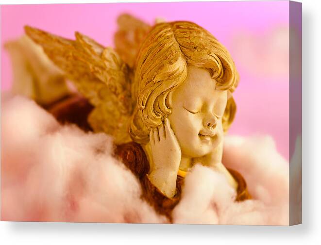 Adorable Canvas Print featuring the photograph Angel resting on clouds and enjoying the sun by U Schade