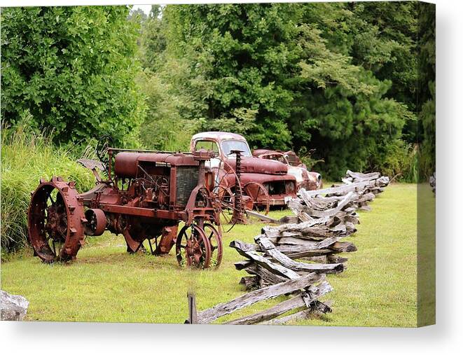 Antique Tractor Canvas Print featuring the photograph Antiques Display by Bill Hosford