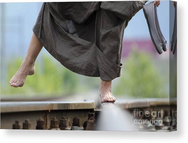 Shoes Canvas Print featuring the photograph Balance on railroad tracks by Mats Silvan
