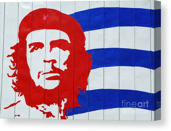 Billboard Canvas Print featuring the photograph Billboard with the iconic Che Guevara portrait and national Cuba by Sami Sarkis