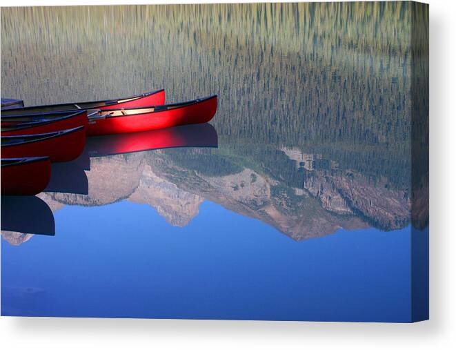 Canoe Canvas Print featuring the photograph Canoes In The Rockies by Steve Parr