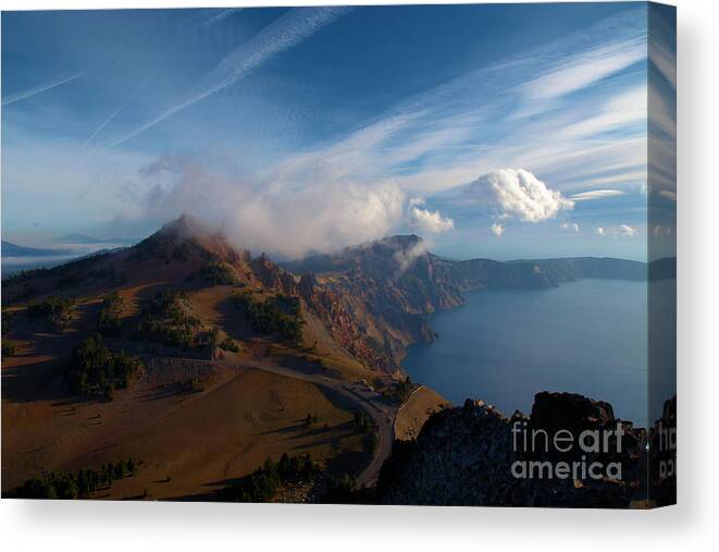 Crater Lake National Park Canvas Print featuring the photograph Clouds On The Horizon by Adam Jewell