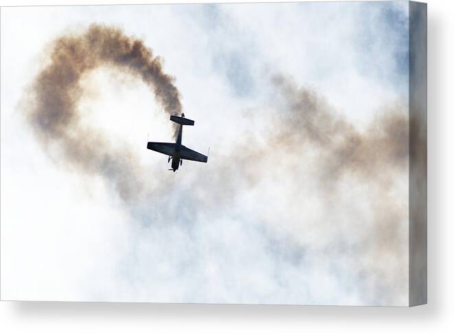 Aerobatic Canvas Print featuring the photograph Extra 300 aerobatic plane and smoke trail by Chris Day