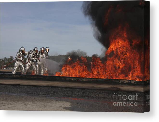 Military Canvas Print featuring the photograph Flames Billow Out Of The Burn Pit by Stocktrek Images