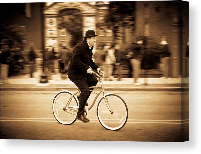 Man Bike Street Photography Sepia Canvas Print featuring the photograph Man on Bike by Keith Allen
