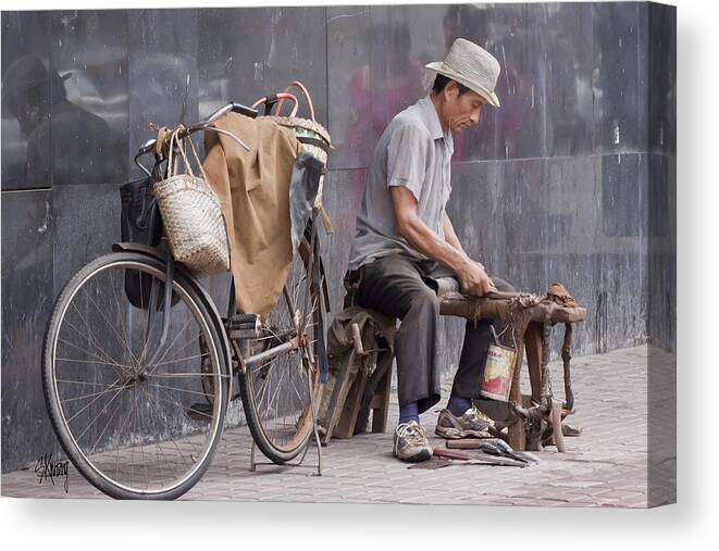 Mobile Knife Sharpener Canvas Print featuring the photograph Mobile Sharpener by Stan Kwong