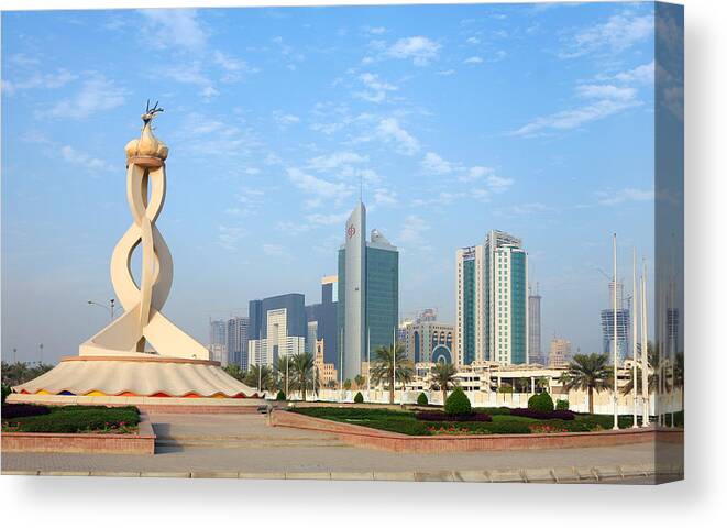 Oryx; Roundabout; Monument; Qatar; Qatar; Arabia; Commercial; District; Traffic Circle; High Rise; Construction; Architecture; Postmodern; Landscape Canvas Print featuring the photograph Oryx Roundabout in Qatar by Paul Cowan